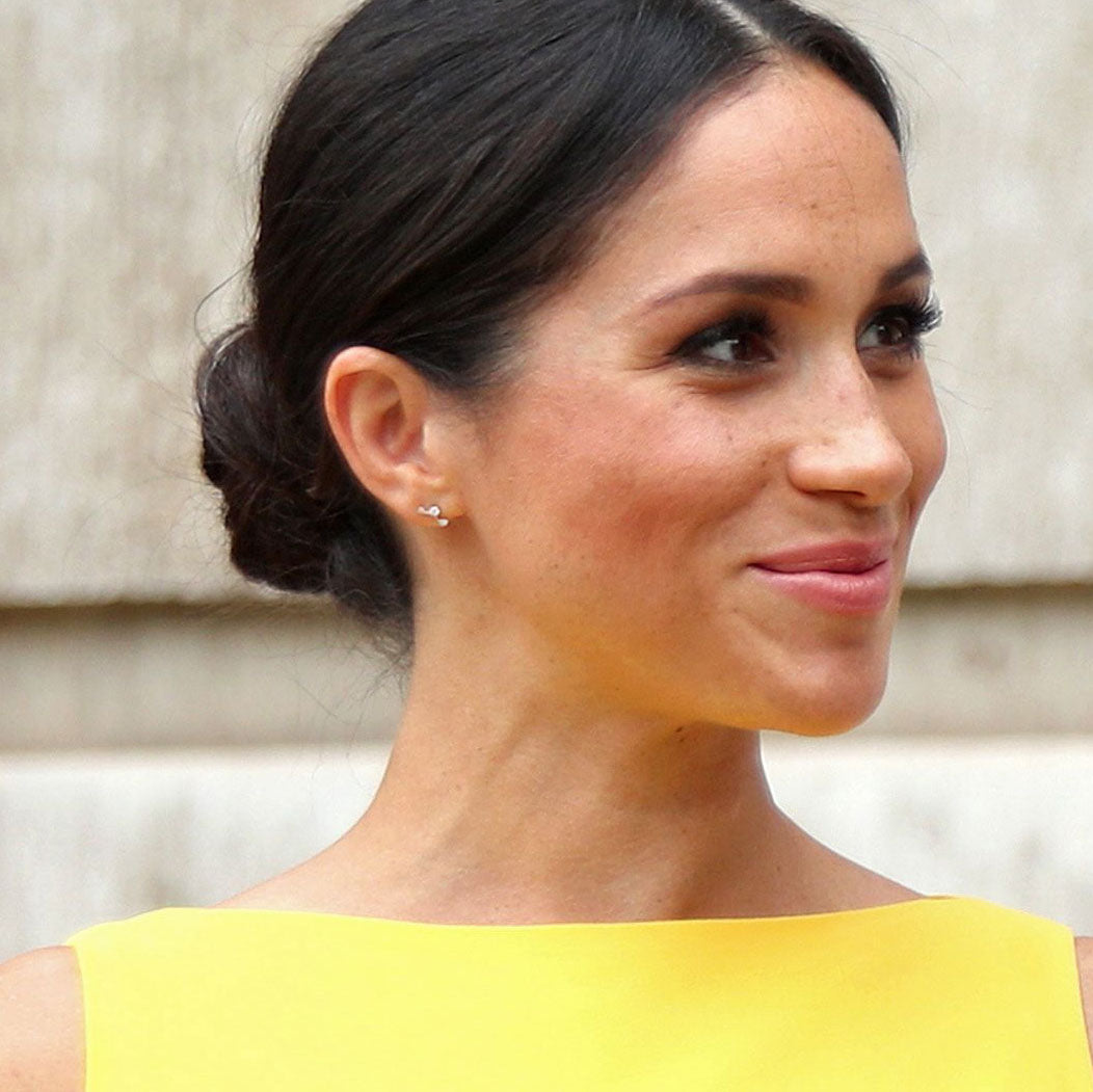 Meghan Markle in Adina Reyter 3 diamond amigos earrings