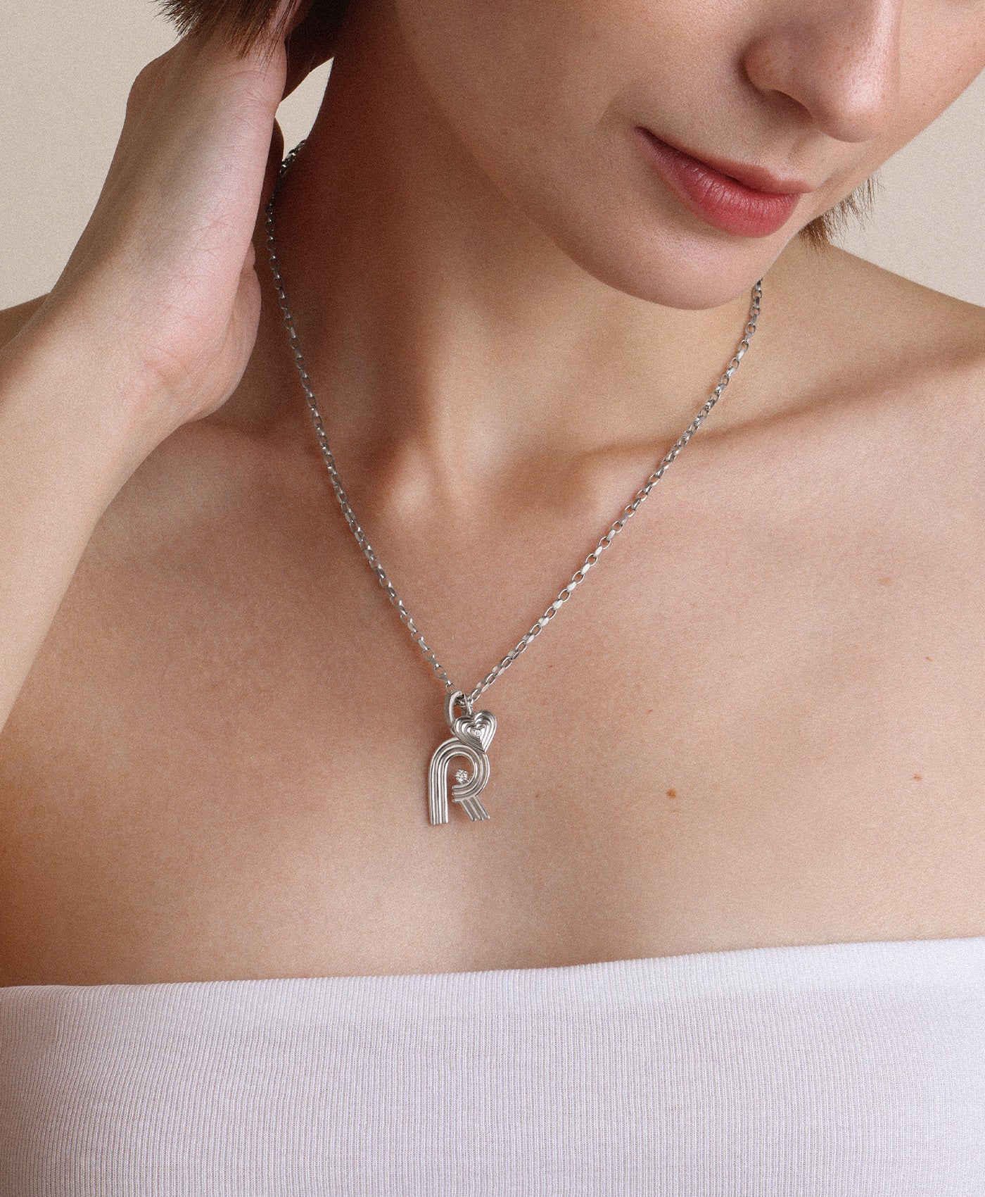 Groovy Diamond Love Charm Necklace in Sterling Silver