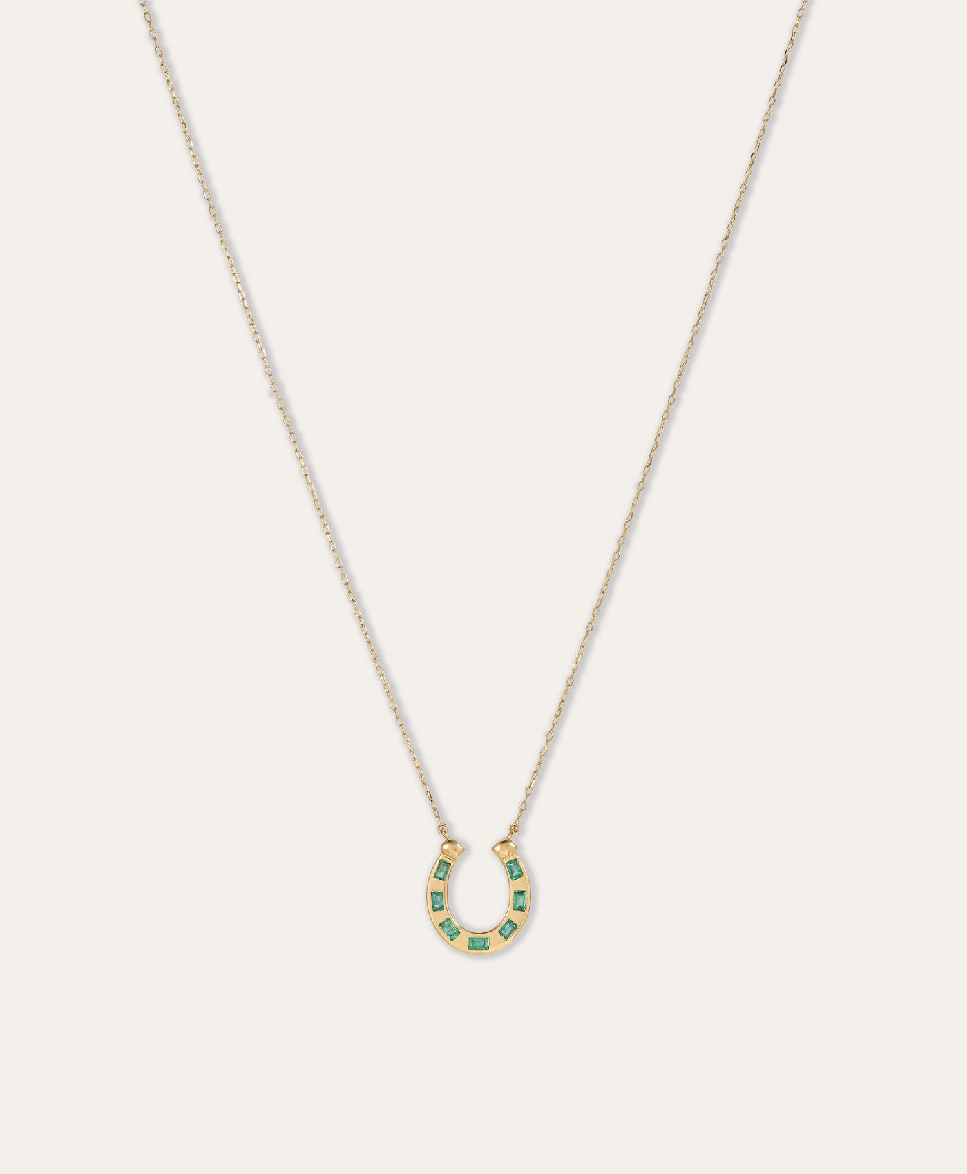 One of a Kind Emerald Baguette Horseshoe Necklace